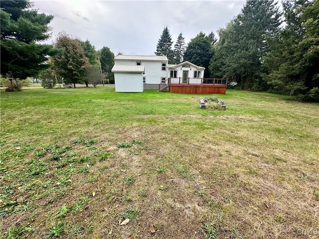 view of yard with a deck