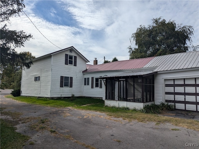 exterior space featuring a garage