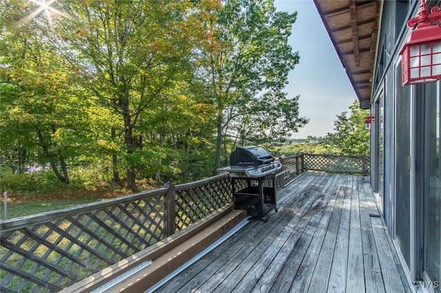 deck featuring a grill