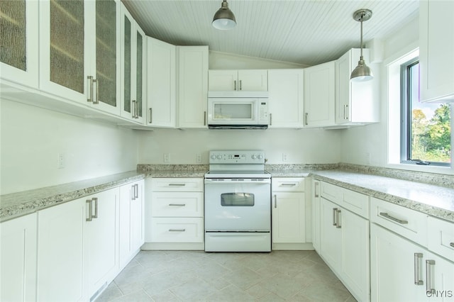 kitchen with white cabinets, decorative light fixtures, vaulted ceiling, and white appliances