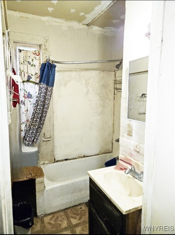 bathroom featuring shower / tub combo, parquet flooring, and vanity