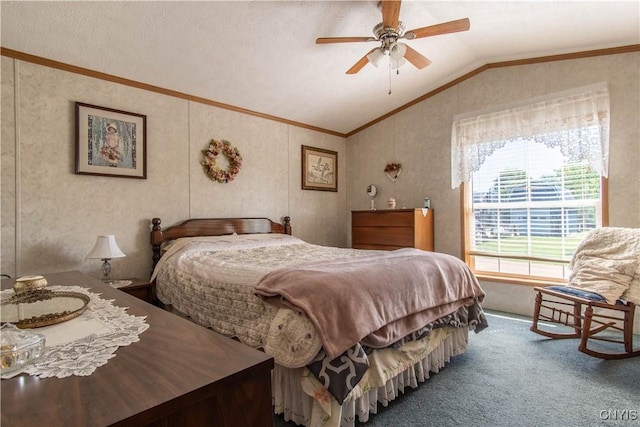 carpeted bedroom featuring lofted ceiling, a ceiling fan, and ornamental molding