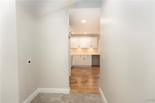 hallway with light wood-type flooring