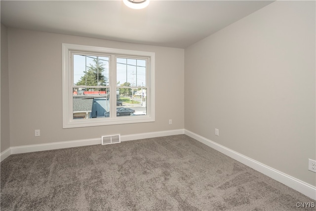 view of carpeted spare room