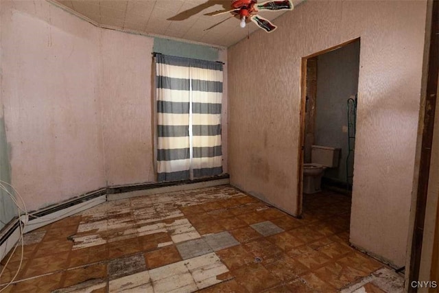 unfurnished room with ceiling fan