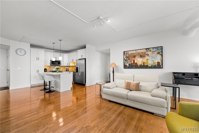 living room with light wood-type flooring