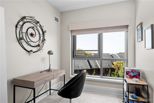 home office featuring a wealth of natural light