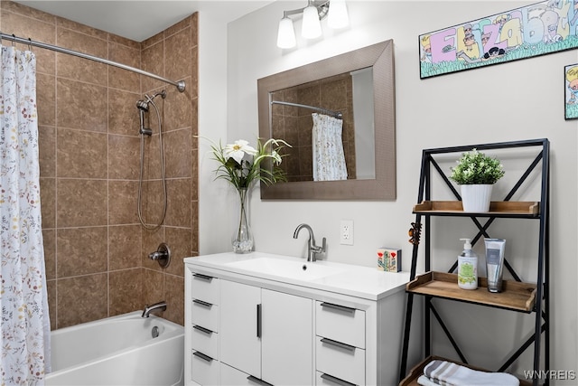 bathroom featuring shower / tub combo and vanity