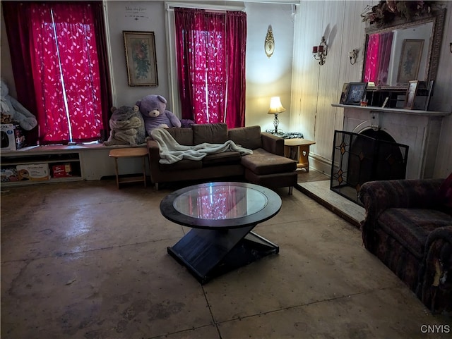 living room featuring concrete floors