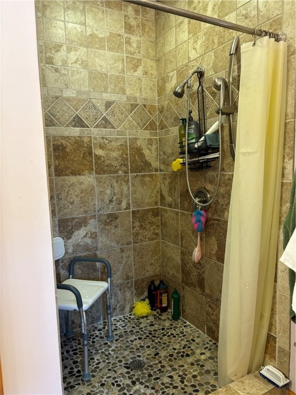 bathroom with a shower with curtain