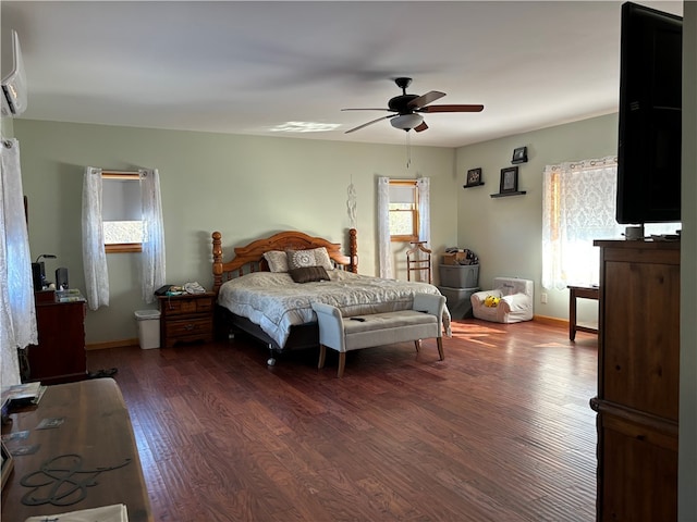 bedroom featuring ceiling fan and dark hardwood / wood-style flooring