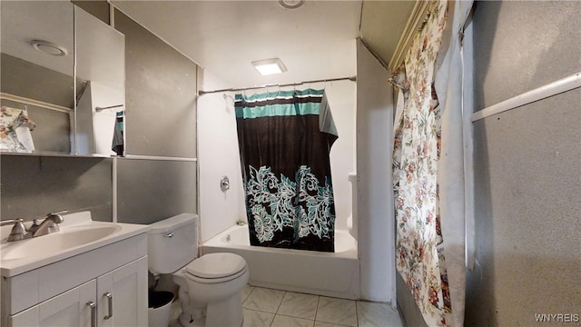 full bathroom with shower / tub combo with curtain, tile patterned flooring, vanity, and toilet