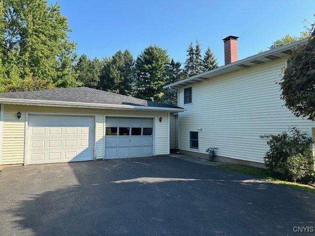 view of home's exterior with a garage