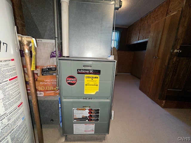 utilities featuring gas water heater and heating unit