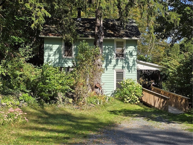 exterior space with a lawn