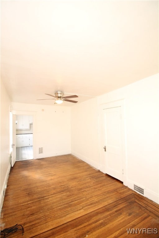 interior space featuring ceiling fan and hardwood / wood-style flooring