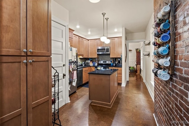 kitchen featuring appliances with stainless steel finishes, a kitchen island, pendant lighting, and brick wall