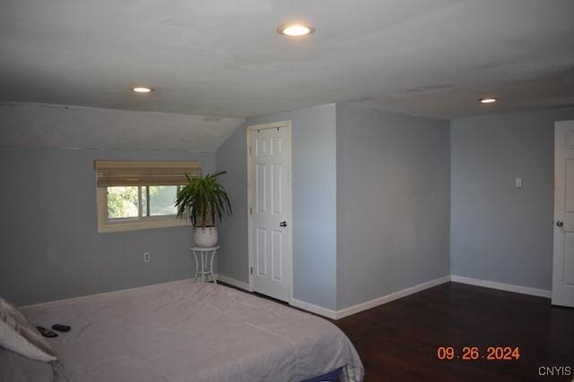 604 Oneida Lake Ave, Sullivan, NY 13032 - bedroom featuring recessed lighting, baseboards, vaulted ceiling, and wood finished floors