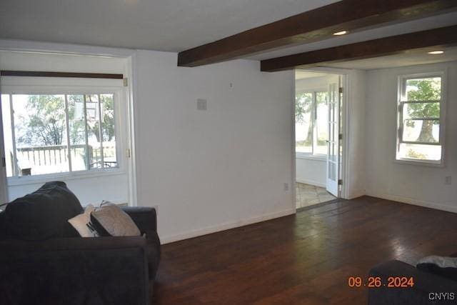 604 Oneida Lake Ave, Sullivan, NY 13032 - living room with wood finished floors, beam ceiling, baseboards, and recessed lighting