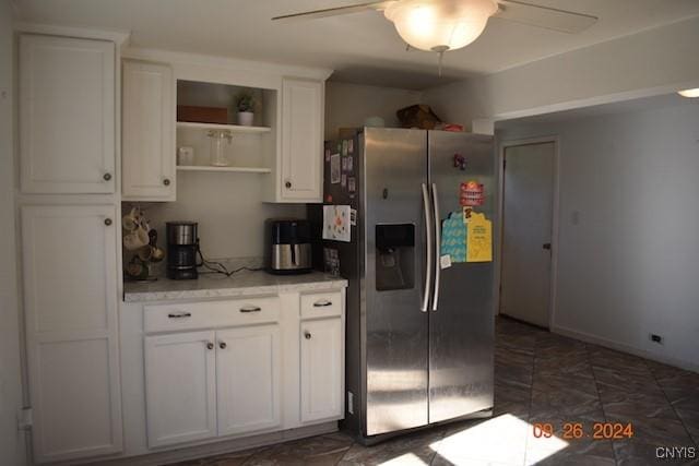 604 Oneida Lake Ave, Sullivan, NY 13032 - kitchen with stainless steel fridge with ice dispenser, a ceiling fan, open shelves, white cabinetry, and light stone countertops