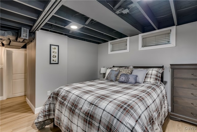 bedroom with light hardwood / wood-style floors