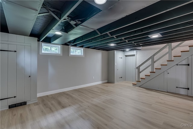 basement featuring hardwood / wood-style floors