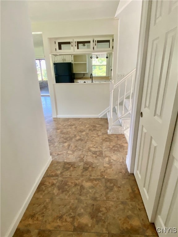 hallway featuring sink