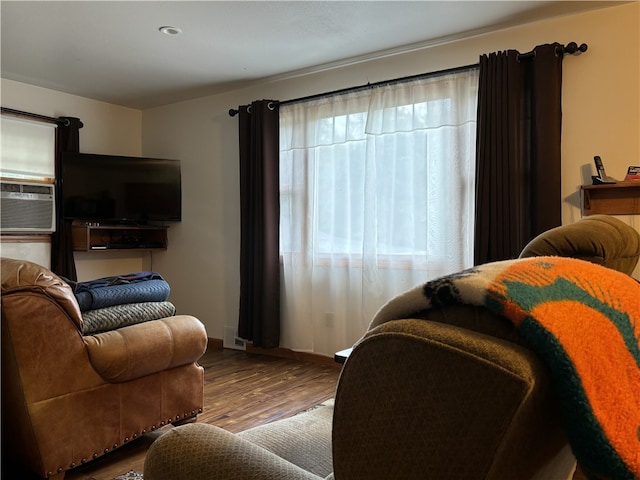 living room with wood-type flooring