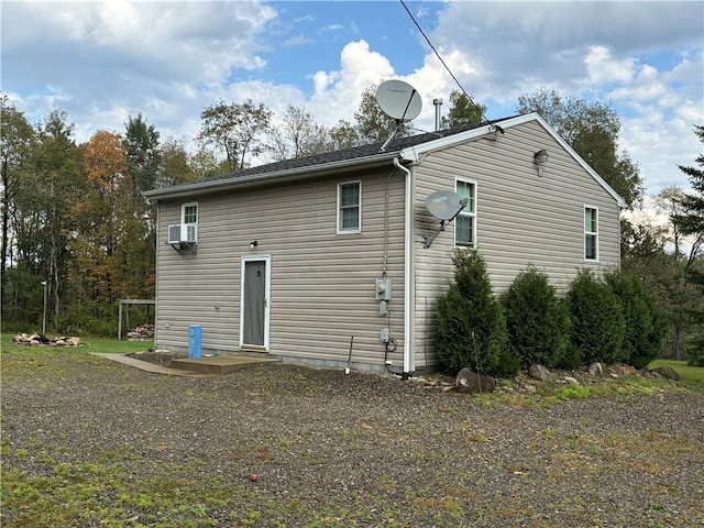 back of property with cooling unit