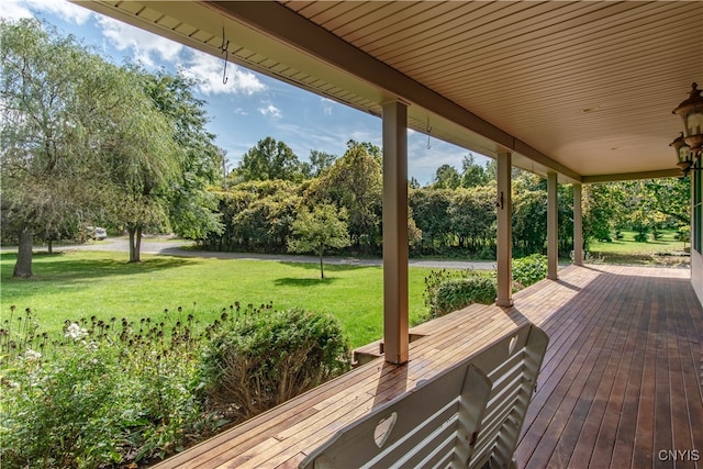 deck featuring a lawn