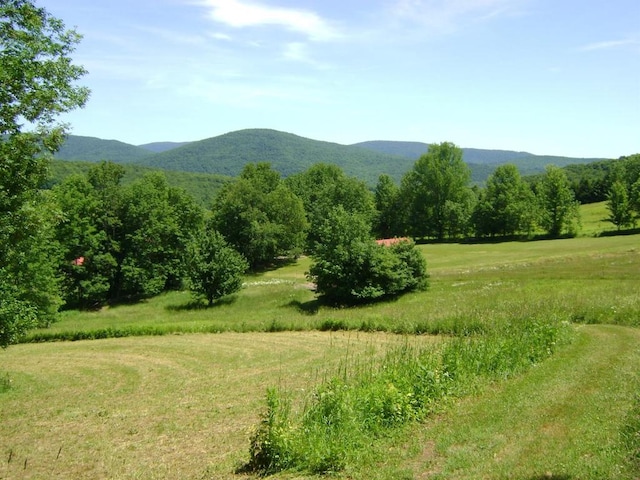 mountain view featuring a rural view