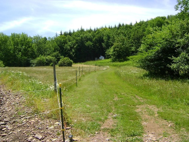 exterior space with a rural view