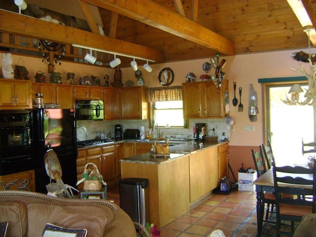 kitchen with beamed ceiling, wood ceiling, backsplash, and black appliances