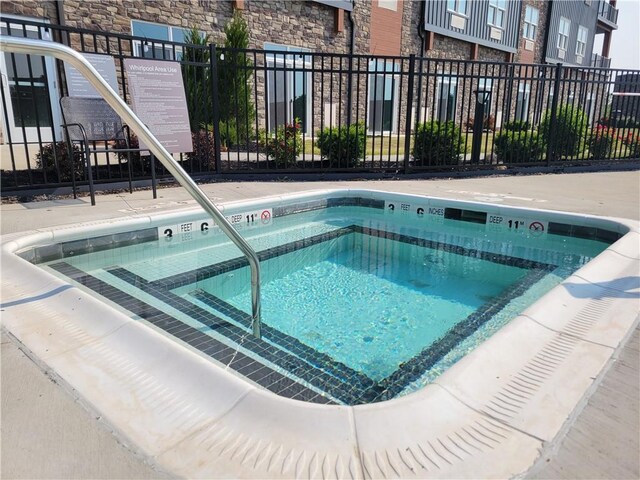 205 Lakeshore Dr Unit 520, Canandaigua City, NY 14424 - view of pool featuring a community hot tub and a pool