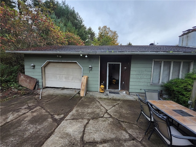 exterior space with a garage