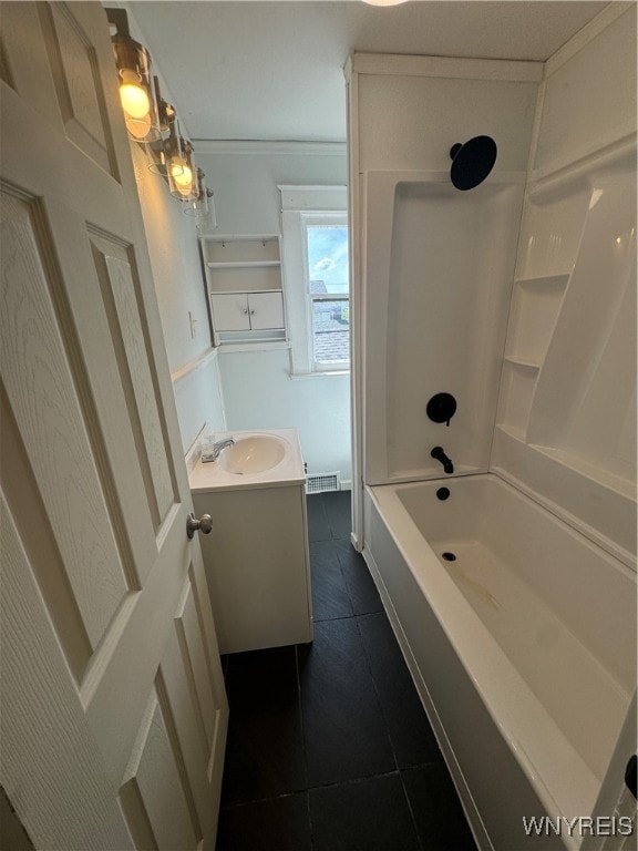 bathroom featuring tile patterned floors, shower / tub combination, vanity, and crown molding