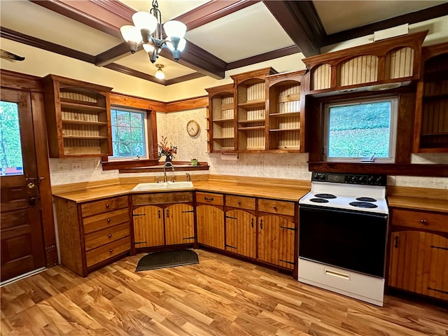 kitchen featuring wooden counters, white electric stove, an inviting chandelier, light hardwood / wood-style flooring, and decorative light fixtures