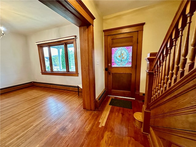 foyer entrance featuring hardwood / wood-style flooring