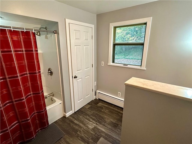 247 W Corydon St, Bradford-Town, PA 16701 - full bath featuring a baseboard heating unit, wood finished floors, and shower / bath combo with shower curtain