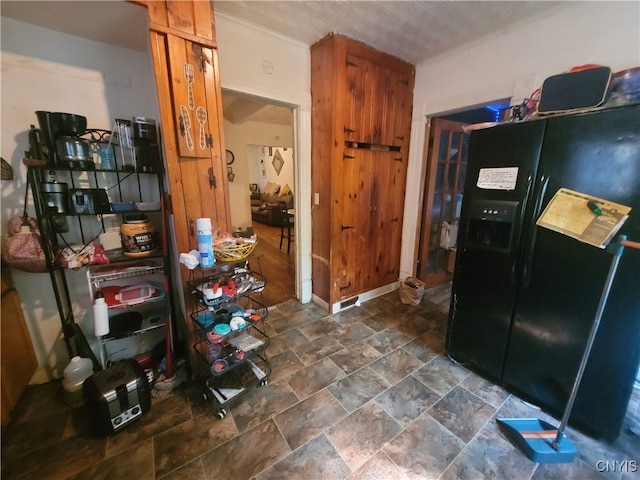 kitchen with black fridge