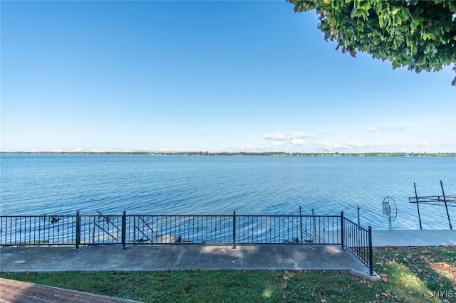 property view of water featuring a boat dock