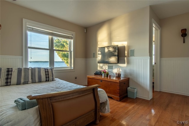 bedroom with wood-type flooring