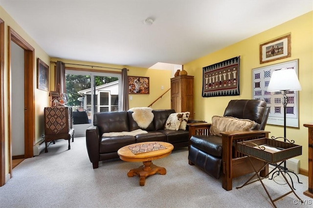 living room with light carpet and a baseboard heating unit