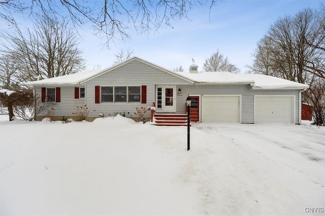 single story home with a garage