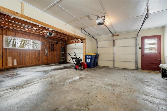 garage featuring a garage door opener