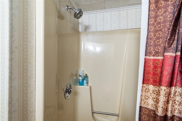 bathroom featuring walk in shower