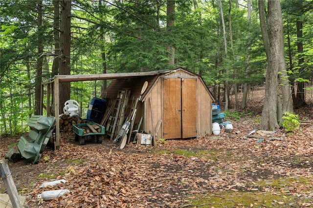 7682 Cottage Rd Unit 2, Wolcott, NY 14590 - view of shed with a forest view