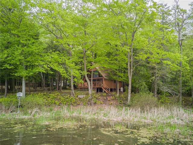 view of landscape featuring a water view