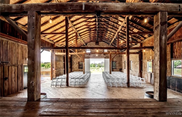 misc room featuring wood-type flooring, beamed ceiling, high vaulted ceiling, and wooden ceiling