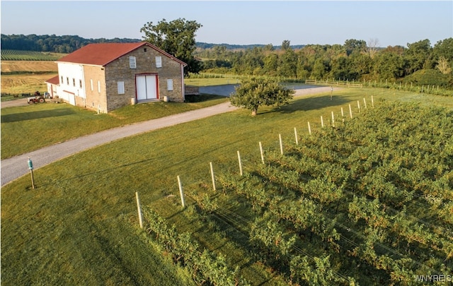 birds eye view of property featuring a rural view